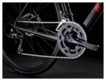 Vélo de route Trek Domane AL 2 rouge équipé du groupe Shimano Claris 8 vitesses, roues 700mm, génération 4-6